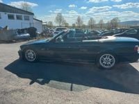 Gebraucht BMW 318 Cabriolet Basis 115 PS (84 kW) 1997 Grün Cabrio