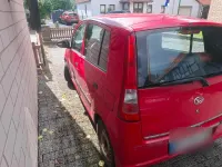 Gebraucht Daihatsu Cuore Plus 58 PS (42 kW) 2001 Rot Kleinwagen