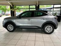Gebraucht Opel Mokka-e Edition 100 kW (136 PS) 2023 Kontrast grau/quarz silber SUV