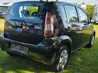 Gebraucht Daihatsu Sirion 69 PS (50 kW) 2008 Schwarz Kleinwagen