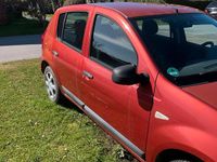 Second-hand Dacia Sandero 75 CP (55 kW) 2009 Roșu Hatchback