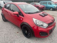 Gebraucht Kia Rio Edition 7 109 PS (80 kW) 2013 (beg) signal red (bordeaux) (metallic) Limousine