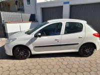Gebraucht Peugeot 206+ 75 PS (55 kW) 2010 Weiß Kleinwagen