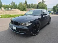 Gebraucht BMW 116 122 PS (89 kW) 2009 Schwarz Kleinwagen