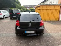 Gebraucht BMW 116 122 PS (89 kW) 2010 Schwarz Kleinwagen