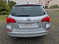Second-hand Opel Astra 165 CP (121 kW) 2014 Argintiu Break