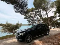 Używany BMW X1 xLine 184 KM (135 kW) 2012 Czarny SUV