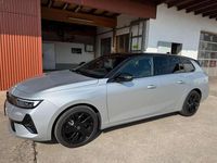 Gebraucht Opel Astra 131 PS (96 kW) 2024 Silbermet. dach schwarz Kombi