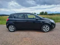 Gebraucht Opel Corsa Satellite 101 PS (74 kW) 2011 Schwarz Kleinwagen