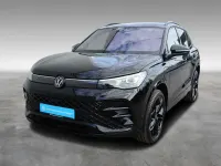 Gebraucht VW Tiguan R-line 272 PS (200 kW) 2025 0e grenadillschwarz metallic SUV