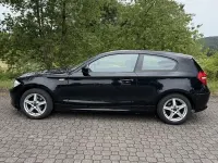 Gebraucht BMW 116 122 PS (89 kW) 2010 Schwarz Kleinwagen