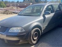 Second-hand VW Passat 102 CP (75 kW) 2005 Gri Break