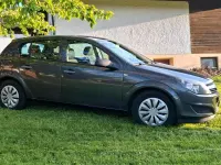Używany Opel Astra 115 KM (84 kW) 2009 Szary Sedan/Limuzyna