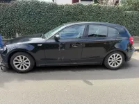 Second-hand BMW 116 122 CP (89 kW) 2009 Negru Hatchback