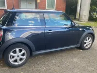 Gebraucht Mini Cooper 95 PS (69 kW) 2009 Schwarz Kleinwagen
