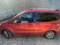 Gebraucht Ford Tourneo Courier Titanium 101 PS (74 kW) 2015 Rot Van / Kleinbus