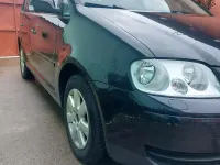 Używany VW Touran 105 KM (77 kW) 2006 Czarny Minivan