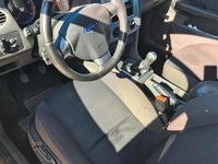 Second-hand Ford Focus 100 CP (73 kW) 2005 Argintiu Coupe