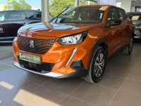 Gebraucht Peugeot e-2008 Active 100 kW (136 PS) 2023 Orange SUV
