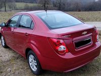 Gebraucht Chevrolet Aveo LT 101 PS (74 kW) 2013 Rot Limousine
