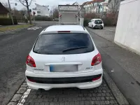 Gebraucht Peugeot 206+ 73 PS (53 kW) 2012 Weiß Kleinwagen