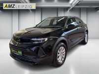 Gebraucht Opel Mokka Enjoy 131 PS (96 kW) 2023 Lackierung schwarz perla nera/typ aussen (metallic) SUV