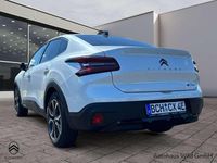 Gebraucht Citroën e-C4 Shine 100 kW (136 PS) 2023 Perlmuttweiss/perlm Limousine