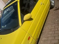Gebraucht Ford Escort Cabriolet 90 PS (66 kW) 1996 Gelb Cabrio