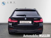 Gebraucht BMW 520 M Sport 190 PS (139 kW) 2022 Black sapphire metallic Kombi