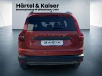 Neu Dacia Jogger Extreme 141 PS (103 kW) 2025 Terracottabraun (braun) Van / Kleinbus