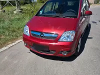Second-hand Opel Meriva 105 CP (77 kW) 2006 Roșu Monovolum