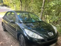 Gebraucht Peugeot 206 75 PS (55 kW) 2010 Schwarz Kleinwagen