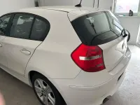Używany BMW 116 122 KM (89 kW) 2009 Biały Hatchback