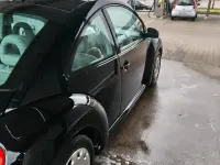 Gebraucht VW New Beetle 75 PS (55 kW) 2002 Schwarz Kleinwagen