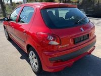 Usado Peugeot 206 Basis 75 HP (55 kW) 2009 Vermelho Sedan