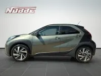 Gebraucht Toyota Aygo X X-plore 72 PS (52 kW) 2023 Cardamom green metallic/dach m SUV