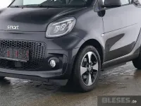 Gebraucht Smart ForTwo Coupé Exclusive 60 kW (82 PS) 2024 Bodypanels in black Kleinwagen