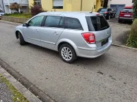Gebraucht Opel Astra Selection 116 PS (85 kW) 2009 Argon silber/ice silver (m2) Kombi