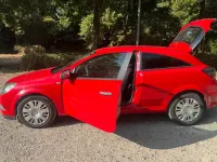 Gebraucht Opel Astra 90 PS (66 kW) 2010 Rot Kombi