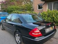 Second-hand Mercedes E320 224 CP (164 kW) 2005 Negru Berlinǎ