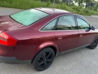 Używany Audi A6 150 KM (110 kW) 1999 Czerwony Sedan/Limuzyna
