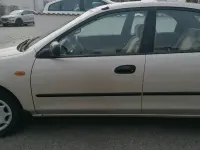 Second-hand Mazda 323 88 CP (64 kW) 1996 Bej Berlinǎ