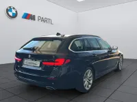 Gebraucht BMW 520 190 PS (139 kW) 2024 Saphirschwarz Kombi
