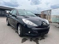 Gebraucht Peugeot 206 73 PS (53 kW) 2012 Schwarz Limousine