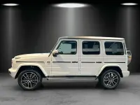 Gebraucht Mercedes G500 AMG line 421 PS (309 kW) 2024 Manufaktur opalithweiß magno SUV