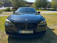Second-hand BMW 730L 245 CP (180 kW) 2011 Negru Berlinǎ