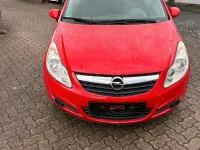 Używany Opel Corsa Eco 70 KM (51 kW) 2010 Czerwony Hatchback