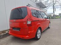 Gebraucht Ford Tourneo Courier Titanium 101 PS (74 kW) 2016 Race red Van / Kleinbus