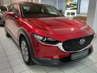Gebraucht Mazda CX-30 122 PS (89 kW) 2023 Magmarot metallic SUV