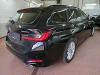 Gebraucht BMW 320e Shadowline 319 PS (234 kW) 2023 Schwarz Kombi